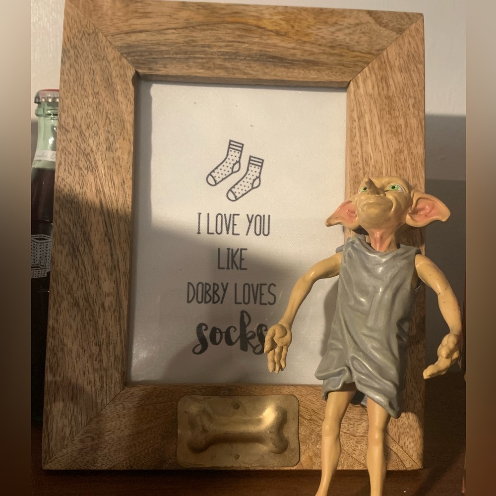 Dobby toy with a Dobby picture